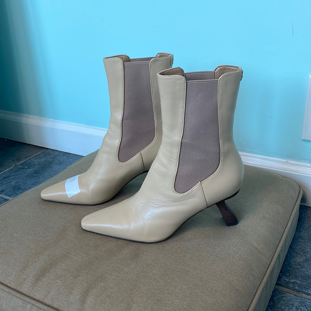 The shoe is a Sam Edelman Sammie Boot